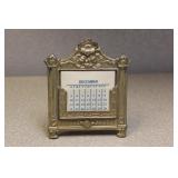 Antique Bronze and Celluloid Calander