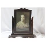 A Black and White Photo or Print of a Lady