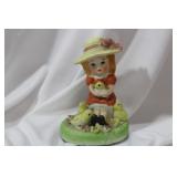 A Ceramic Girl Figurine