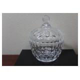 A Facet Glass Jar With Lid