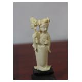 A Carved Bone Beauty on Stand