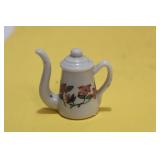 A Miniature Ceramic Teapot