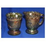 A Carnival Glass Creamer and Sugar Container