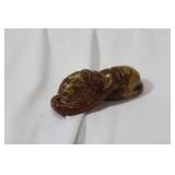 A Chinese Jade or Similar Hardstone Beast Pendant