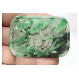 A Chinese Green Jade or Jadeite Pendant
