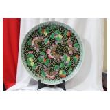 A Chinese Famille Noire Charger