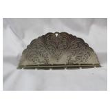 A Metal Spoon Holder