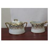 An Antique Nippon Creamer and Sugar Container