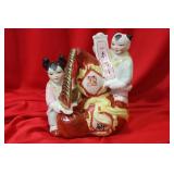 A Chinse Boy and Girl Figurine