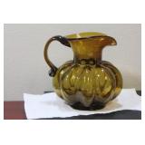 An Amber Glass Water Pitcher