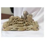 A Carved Soap Stone Scene