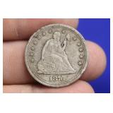 An 1876-S Seated Quarter