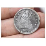 An 1876-CC Seated Quarter
