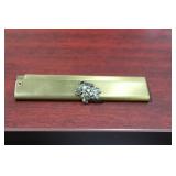 A Vintage Hide Away Metal Comb