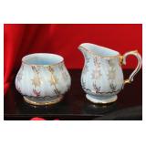 A Ceramic Cream and Sugar Container