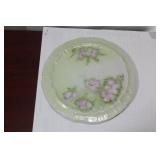 A Signed Porcelain Trivet