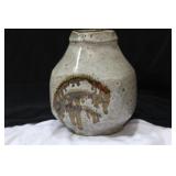 A Hand Painted Pottery Bottle