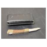 A Pocket Knife Inside a Leather Case