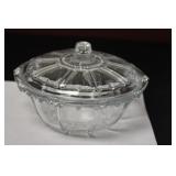 A Round Glass Candy Dish With Lid