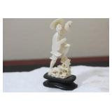 A Chinese Carved Bone Fisherman