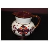 An Old Castle Copper Ceramic Luster Creamer