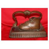 A Bronze or Metal Baby Shoe