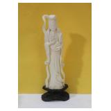 A Carved Bone Figurine