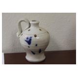 A Small Stonewear Flow Blue Ewer