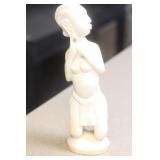 African Bone and Nude Statue