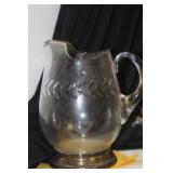 An English Sterling Rim and Cut Glass Pitcher