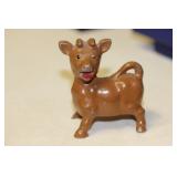 A Metal Cow Pepper Shaker