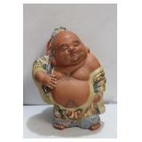 A Japanese Kutani Buddha Figurine