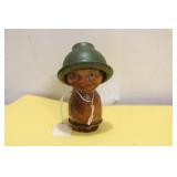 An Antique Figural Stopper