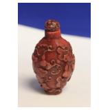 A Carved Resin Snuff Bottle