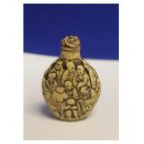 A Carved Resin Snuff Bottle