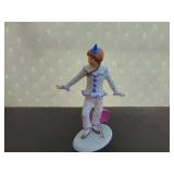 A Kaiser Polychrome Bisque Harlequin Figurine
