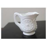 A Small Milk Glass Pitcher
