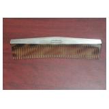 International Sterling and Tiger Skin Lucite Comb