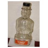 Glass Lincoln Orange Syrup Bank