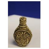 A Carved Resin Snuff Bottle