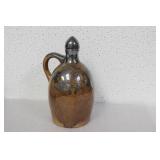 A vintage Sterling Overlay Musical Jug