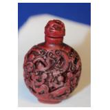 A Carved Resin Snuff Bottle
