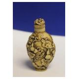 A Carved Resin Snuff Bottle