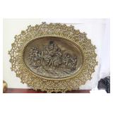 A Framed Bronze Plaque