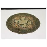 A Vintage Miniature Round Rug