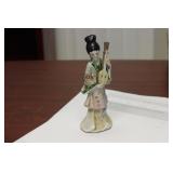 A Chinese Porcelain Musician