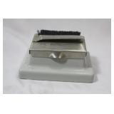 A Vintage Stamp Dispenser Labeler