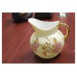 An Antique Rudolstadt Porcelain Creamer