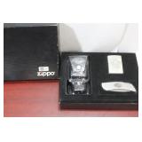 A Harley Davidson Zippo Lighter/Holder/Knife Set