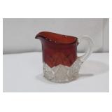 A Small Glass Pitcher